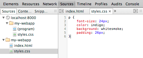 localhost リソースとワークスペース ファイルの両方が表示されている [ソース] パネル。