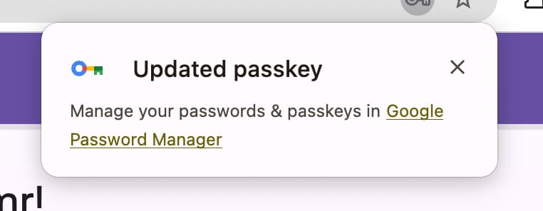 A dialog displayed when a passkey metadata is updated in Google Password Manager on Chrome.